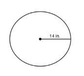 What is the circumference of the given circle in terms of \pi? a. 14\pi in. b. 28\pi-example-1