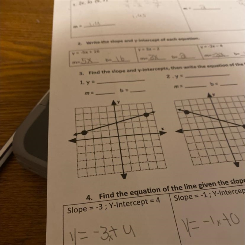 Find the slope and y intercepts then write the equation in slop-intercept form-example-1