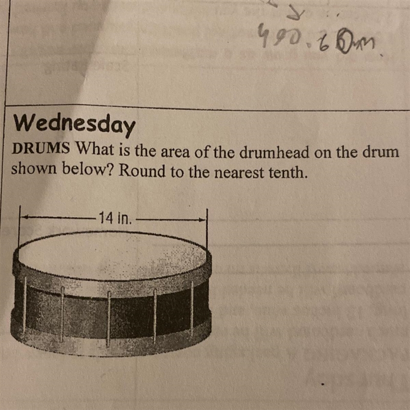 DRUMS What is the area of the drumhead on the drum shown below? Round to the nearest-example-1