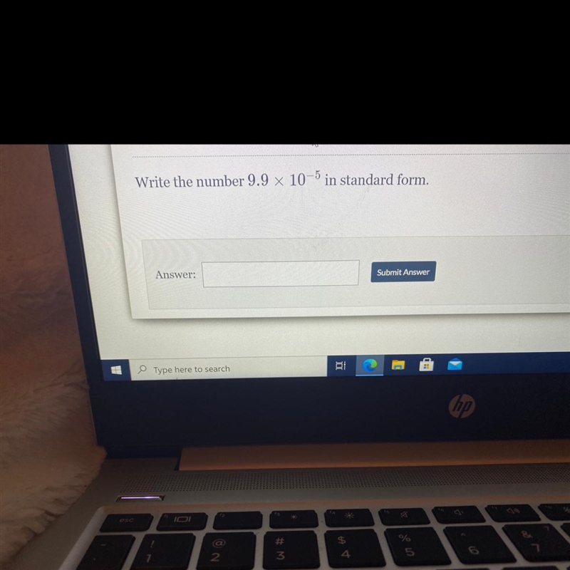 Write the number 9.9 x 10-5 in standard form.-example-1