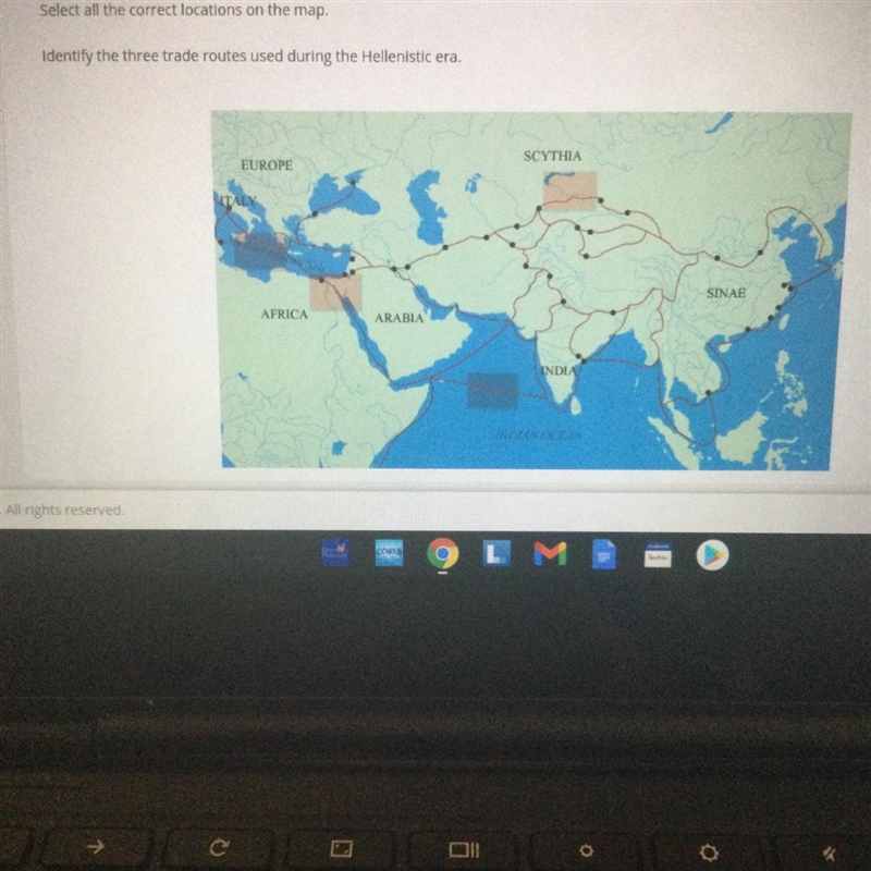Select all the correct locations on the map. Identify the three trade routes used-example-1