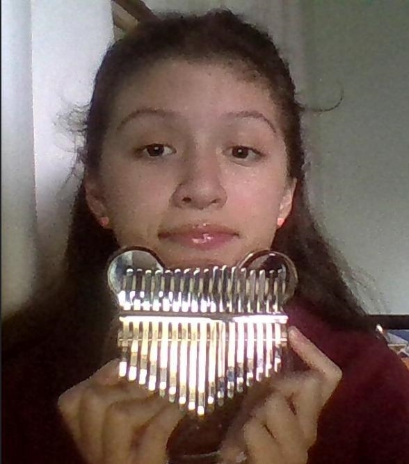 Welp this is me with my instrument...i look weird-example-1