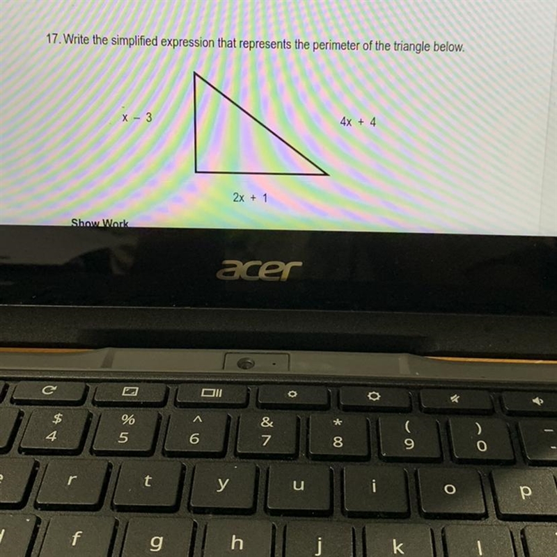 Write the simplified expression that represents the perimeter of the triangle below-example-1