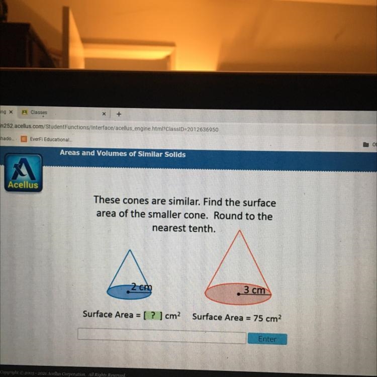 These cones are similar. Find the surface area of the smaller cone. Round to the nearest-example-1