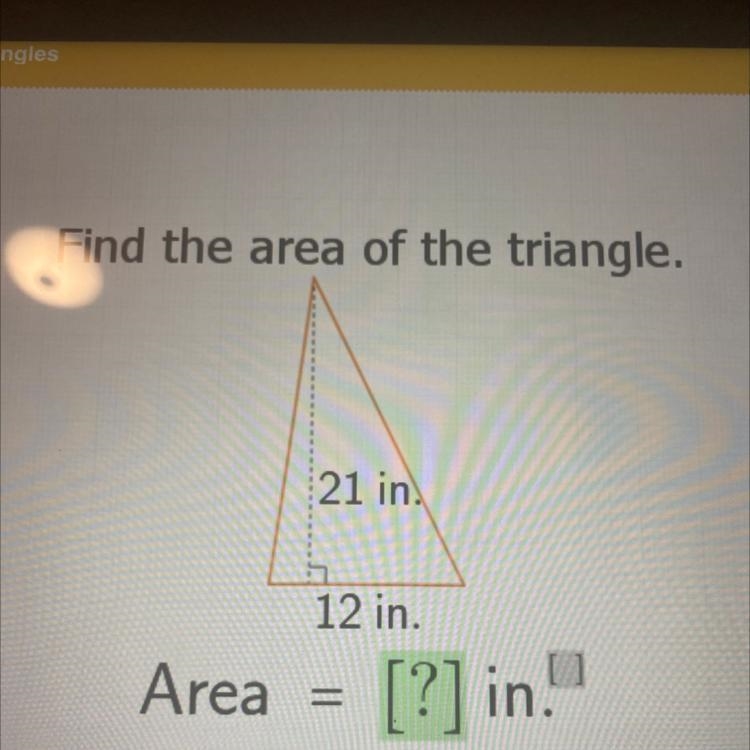 Find the area of the triangle. 21 in. 12 in.-example-1