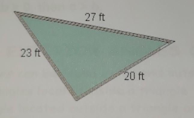 A landscape engineer is designing a triangular area. He wants to place potted trees-example-1