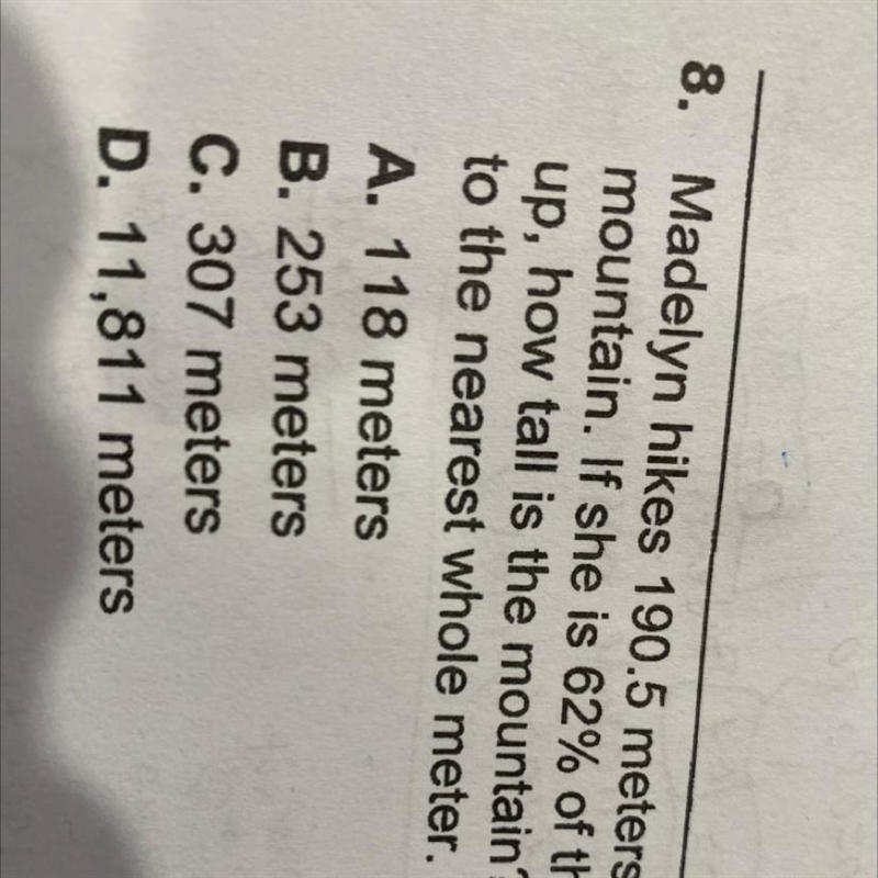 Madelyn hikes 190.5 meters up a mountain. If she is 62% of the way up, how tall is-example-1