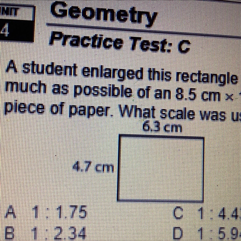 1. A student enlarged this rectangle to fill as much as possible of an 8.5 cm x 11 cm-example-1