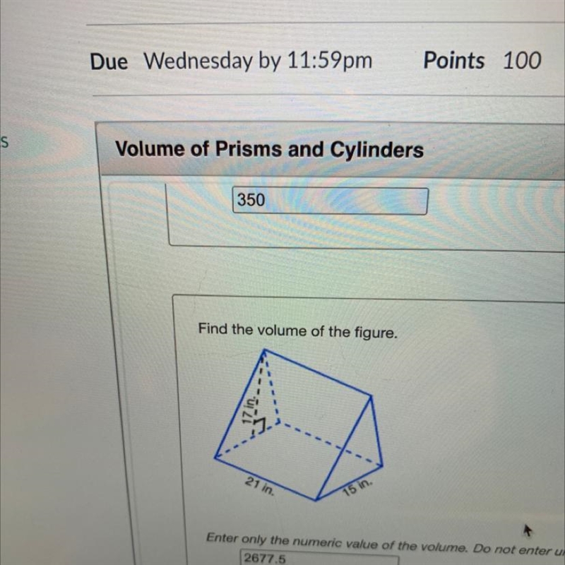 Find the volume of the figure of 7 inches, 21 inches and 15 inches.-example-1