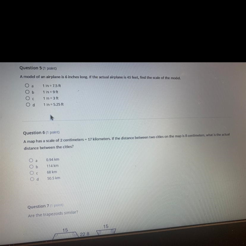 A model of an airplane is 6 inches long. If the actual airplane is 45 feet, find the-example-1