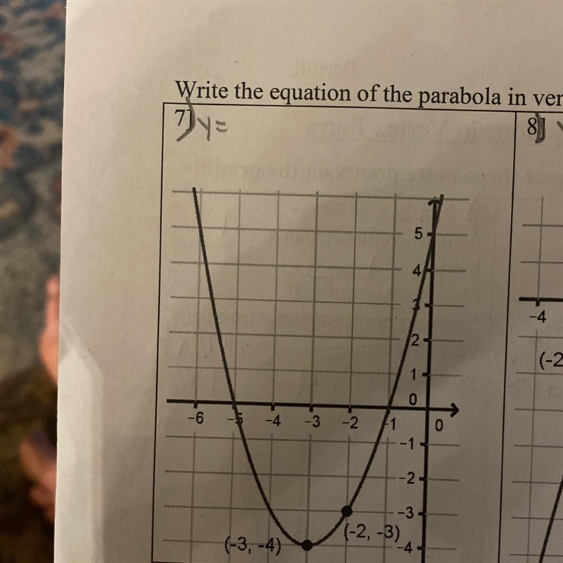 Write the equation of the parabola in vertex form.-example-1