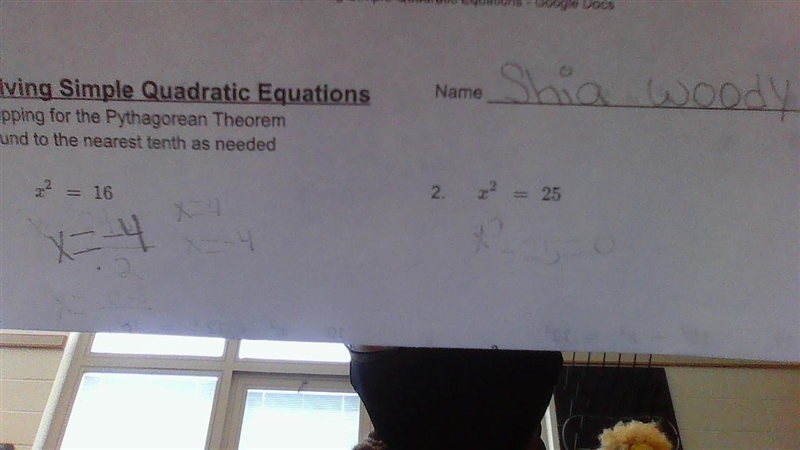 Solving simple quadratic equations.-example-1