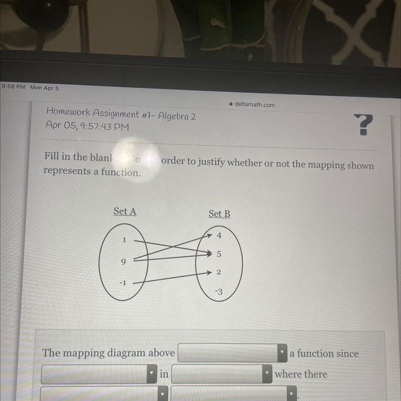 Fill in the blanks below in order to justify whether or not the mapping shown represents-example-1