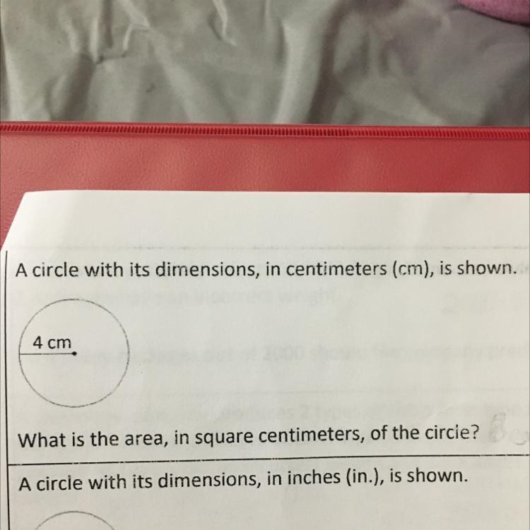 A circle with its dimensions, in centimeters (cm), is shown. What is the area, in-example-1