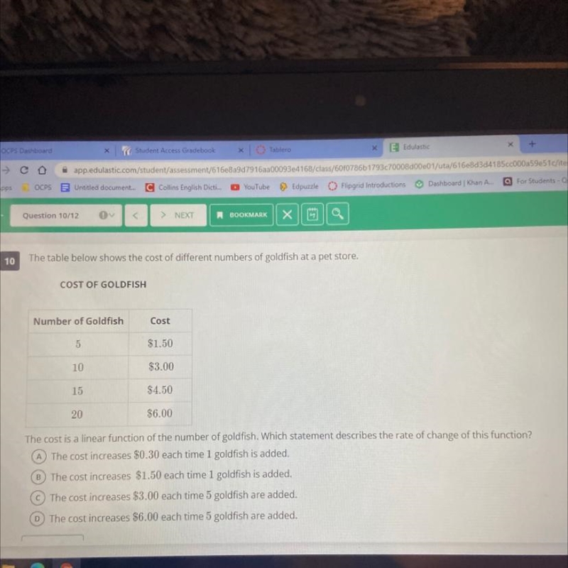 The cost is a linear function of the number of goldfish. Which statement describes-example-1