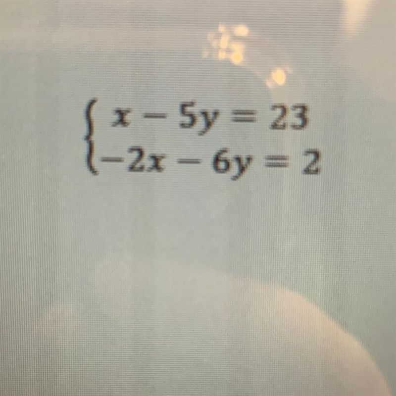 What is the x coordinate of the solution to the system of equations? { x- 5y =23 { -2x-example-1