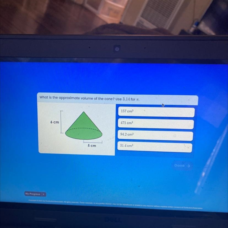 What is the approximate volume of the cone? Use 3.14 for it.help please-example-1