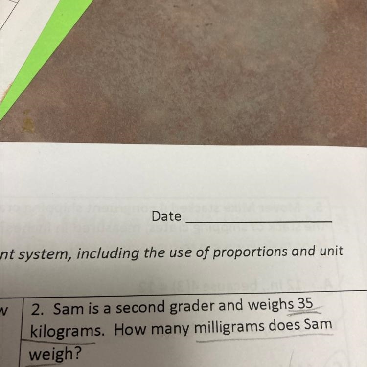 Sam is a second grader and weighs 35 kilograms. How many milligrams does Sam weigh-example-1