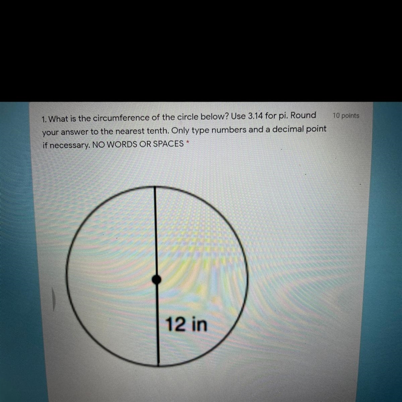 1. What is the circumference of the circle below? Use 3.14 for pi. Round your answer-example-1