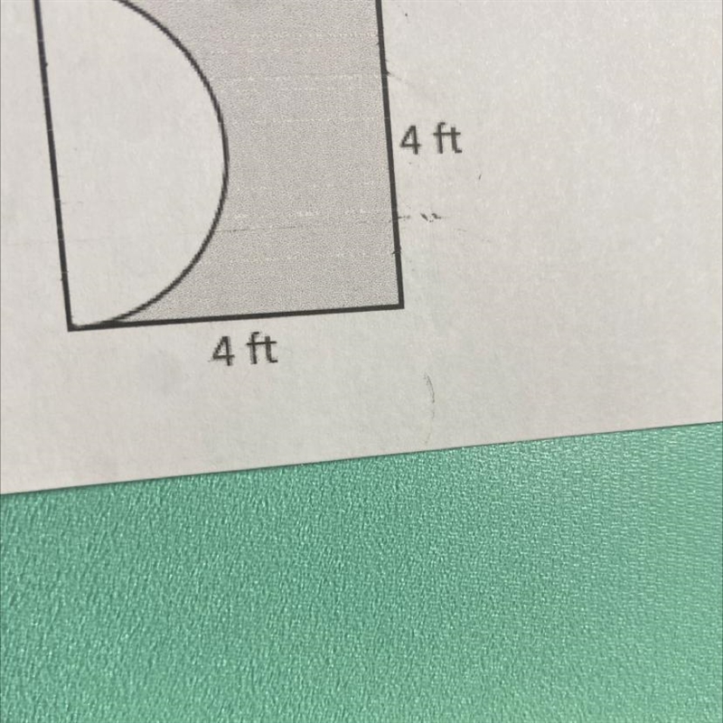 Calculate the area of the shaded region.-example-1