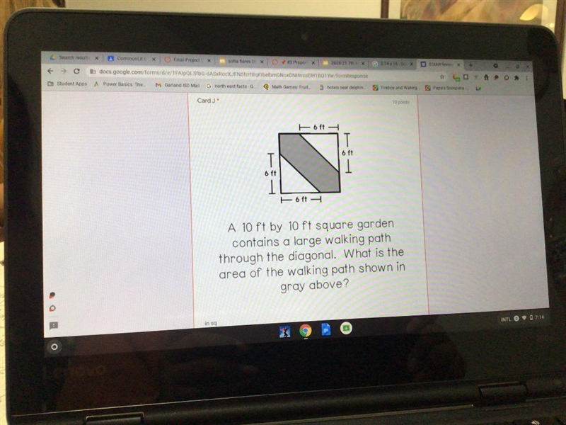 A 10 ft by 10 ft square garden contains a large walking path through the diagonal-example-1