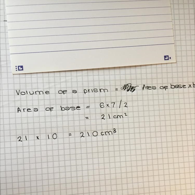 Find the volume of this triangular prism-example-1