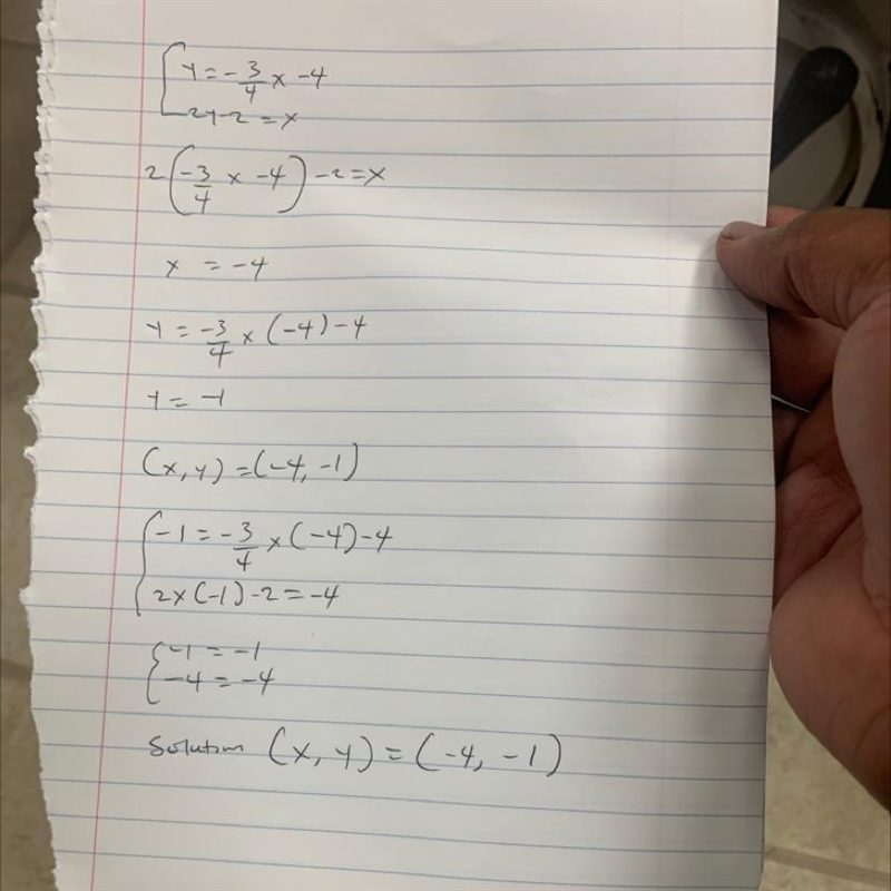 Solve the system below. y= -3/4x-4 2y-2=x-example-1