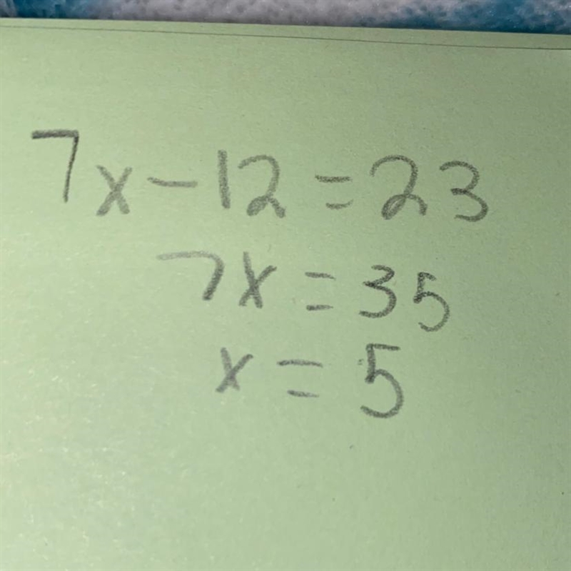 Solve the equation 7x - 12 = 23 What is the answer-example-1