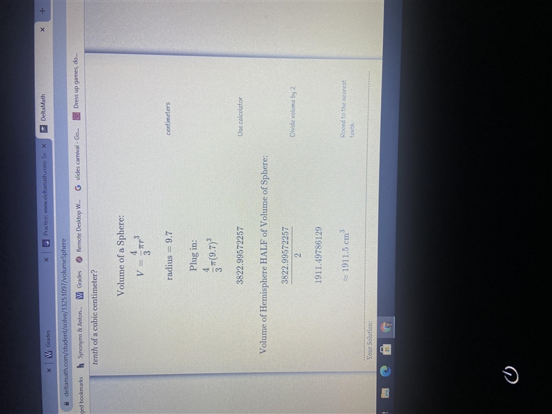 What is the volume of a hemisphere with a radius of 9.7 cm, rounded to the nearest-example-1