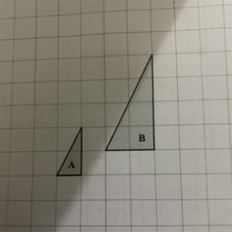 Describe fully the single transformation that maps triangle a onto triangle b-example-1