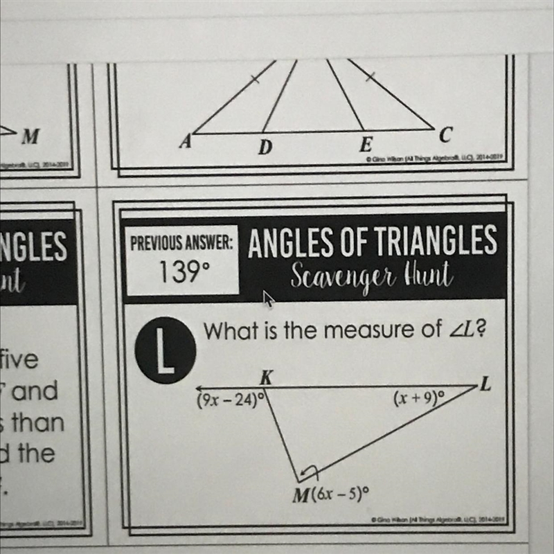 What is the measure of angle L-example-1