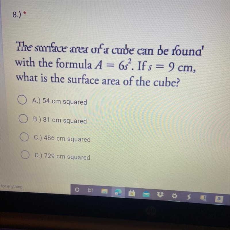 The surface area of a cude can be found' with the formula A = 6s?. Ifs = 9 cm, what-example-1