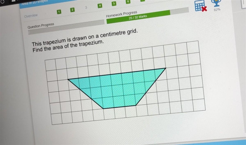 This trapezium is drawn on a centimetre grid. Find the area of the trapezium. ​-example-1