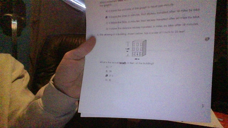 the drawing of a building shown below has a scale of 1 inch to 25 feet what is the-example-1