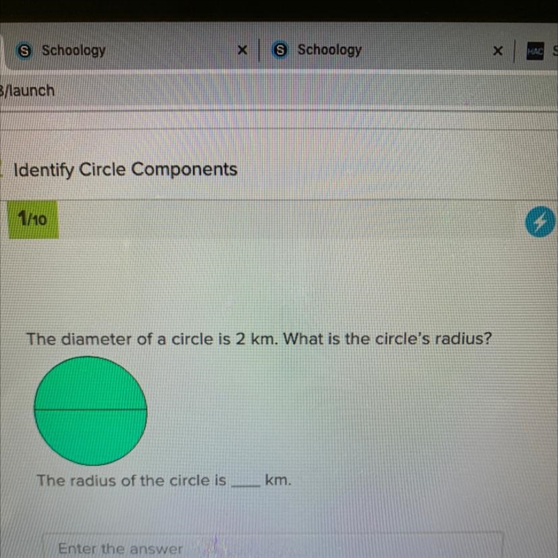 The diameter of a circle is 2 km. What is the circle's radius? The radius of the circle-example-1