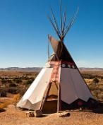 A tepee has a base of 19.5 feet and a height of 16.8 feet. The tepee can hold approximately-example-1