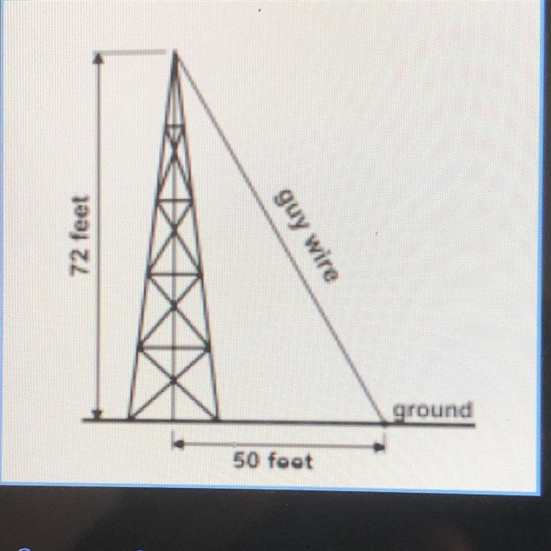 2. A guy wire is attached to the top of a radio tower to help support it. The tower-example-1