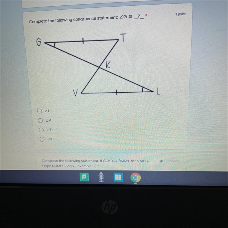 Complete the following congruence statement ∠G ≅ ____?-example-1