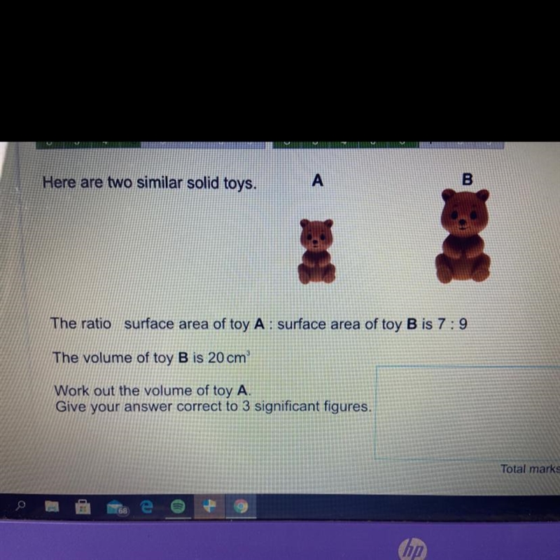 Here are two similar solid toys. The ratio of surface area of toys R: surface area-example-1