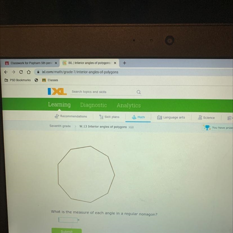 What is the measure of each angle in a regular nonagon?-example-1