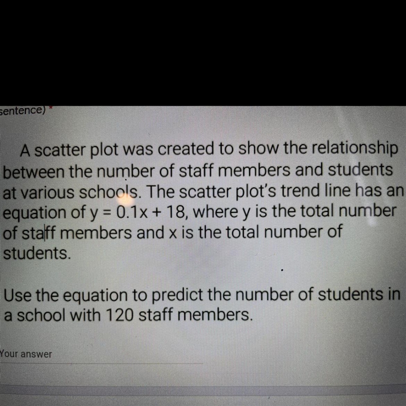 Use the equation to predict the number of students in a school with 120 staff members-example-1