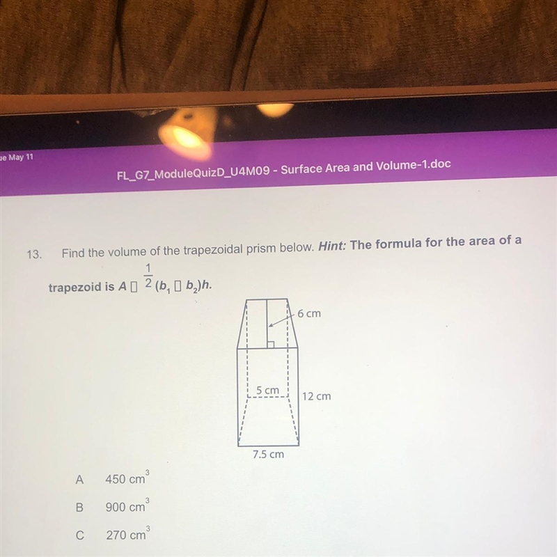 13. Find the volume of the trapezoidal prism below. Hint: The formula for the area-example-1