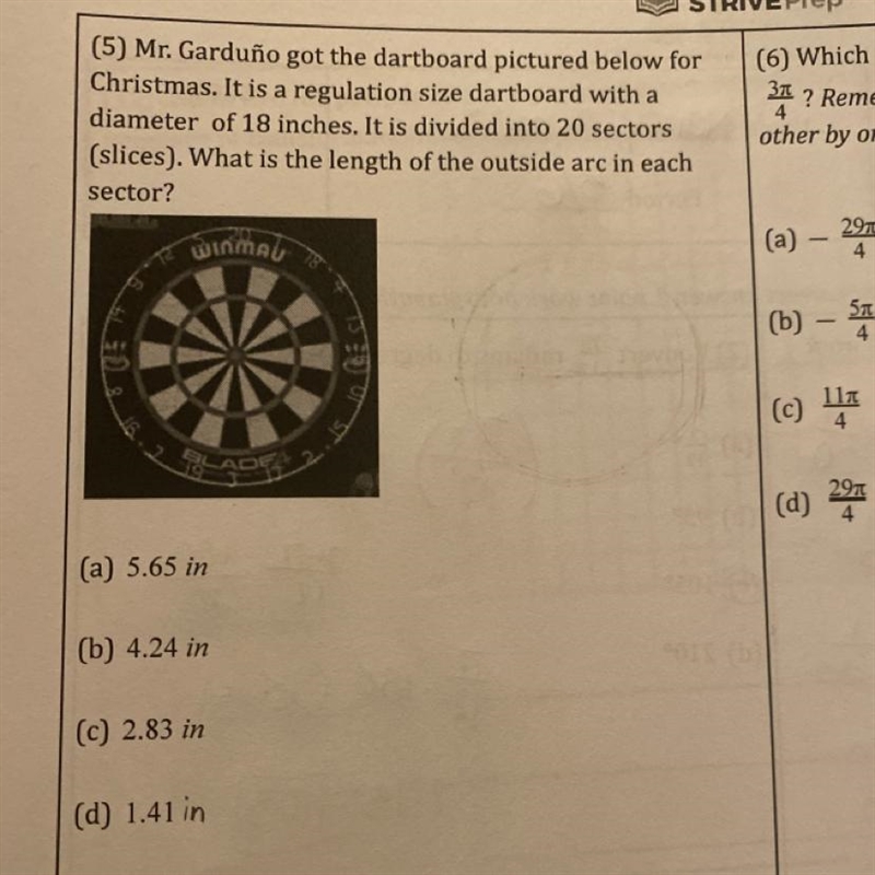 (Mr. Garduño got the dartboard pictured below for Christmas. It is a regulation size-example-1