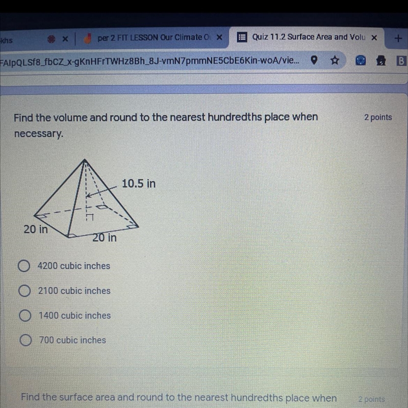 Find the volume and round to the nearest hundredths place when necessary.-example-1