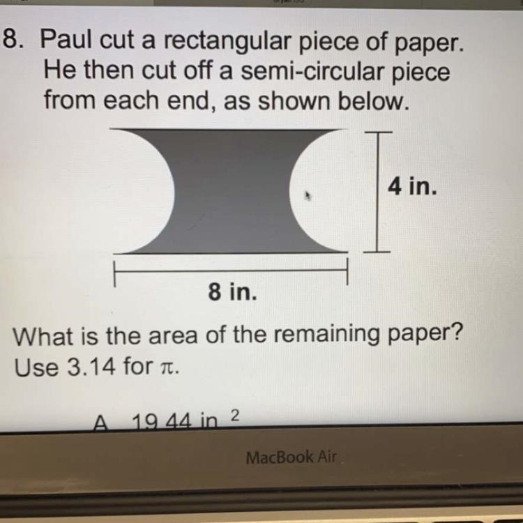 Paul cut a rectangular piece of paper. He then cut off a semi-circular piece from-example-1