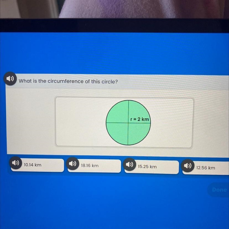 What is the circumference of this circle? r = 2 km 10.14 km 18.16 km 15.25 km 12.56 km-example-1