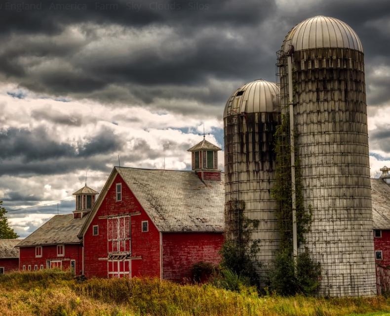 This silo in Vermont is topped with a hemisphere (half of a sphere) dome. If the radius-example-1