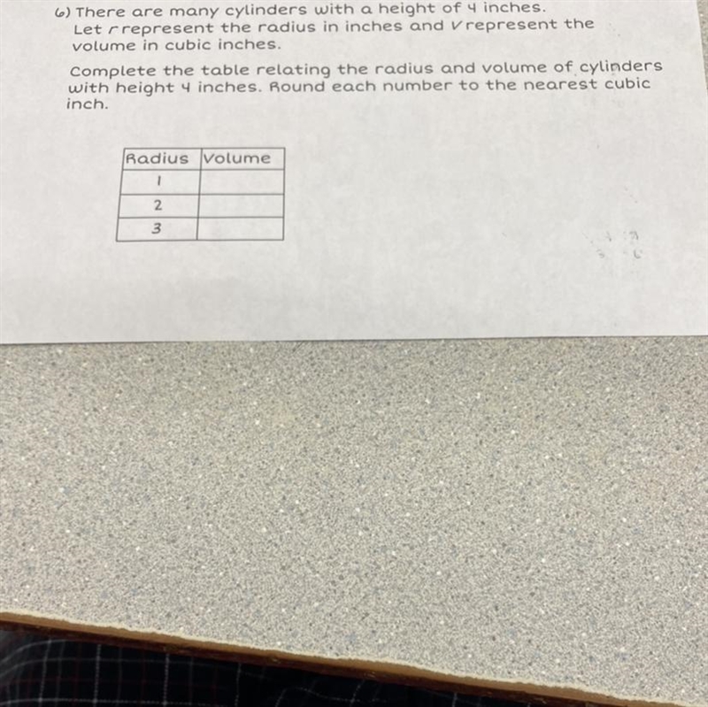 6) There are many cylinders with a height of 4 inches. Let rrepresent the radius in-example-1