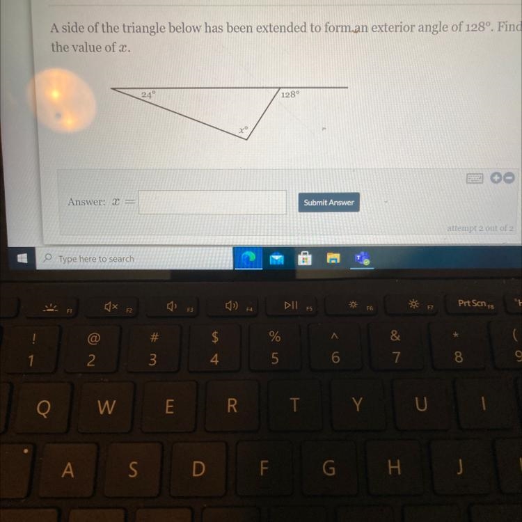 A side of the triangle below has been extended to form an exterior angle of 128°. Find-example-1