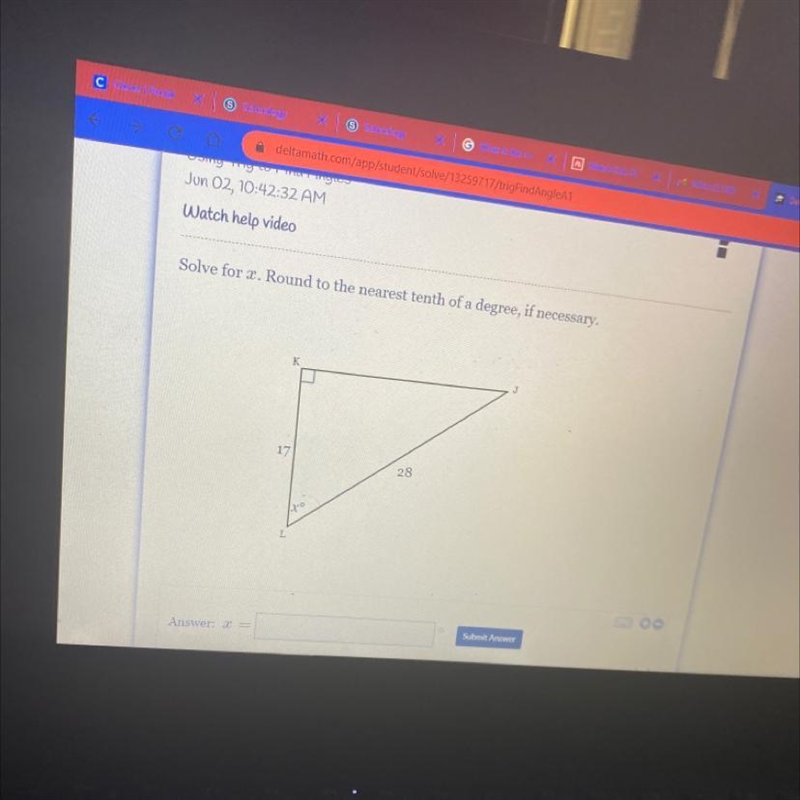 Solve for x. Round to the nearest tenth of a degree, if necessary. K J 17 28 21-0 Submit-example-1